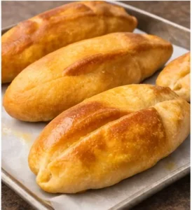 Jamaican cocoa bread on a baking pan