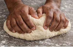 man kneading-the-dough